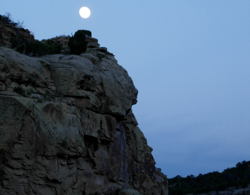 Moon over cliff